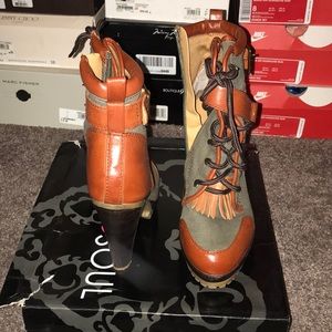 Heeled combat style boot